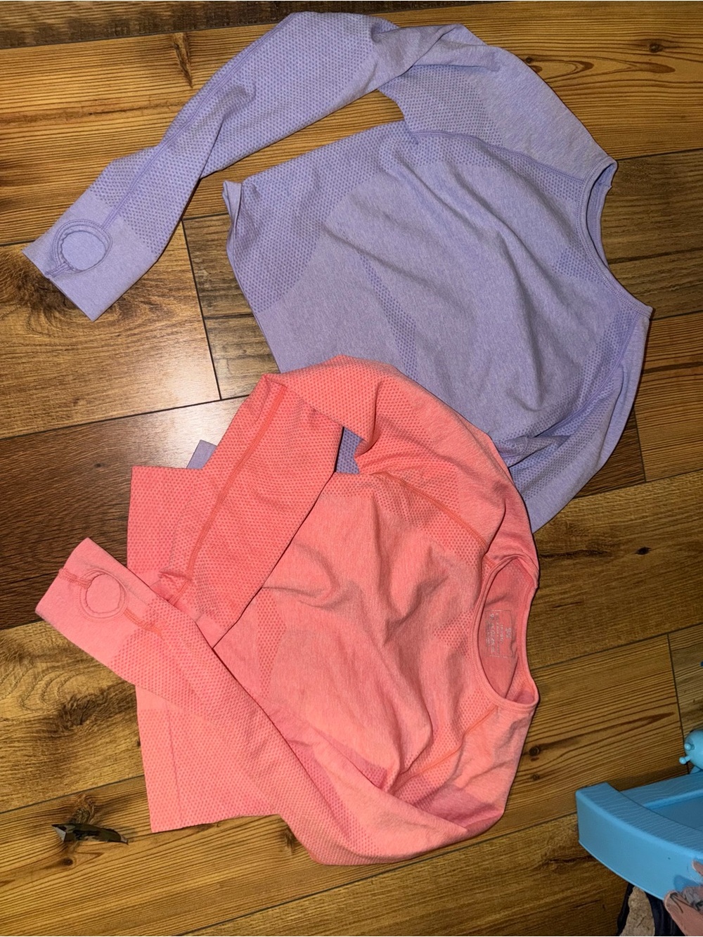 2 long sleeve cropped workout tops with thumb holes